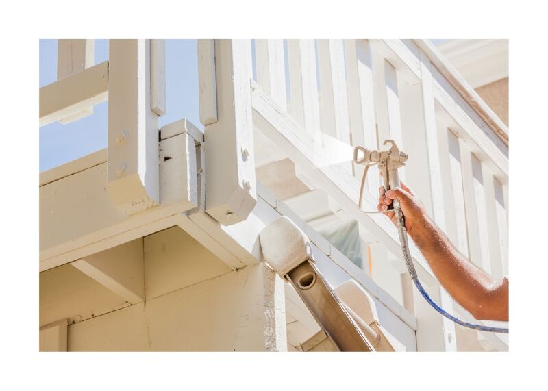 New Westminster Painting - Spraying white deck railings