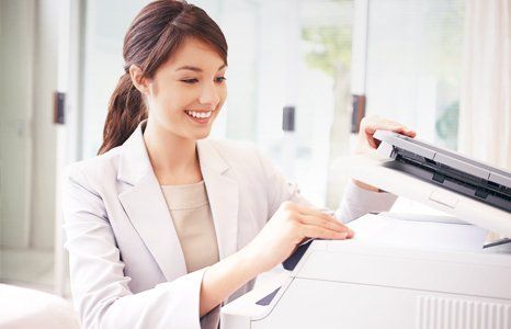 employee taking a printout