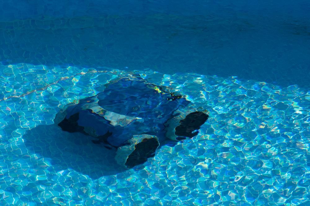 A Robot is Swimming in a Swimming Pool — Sun City Pools In Hyde Park, QLD
