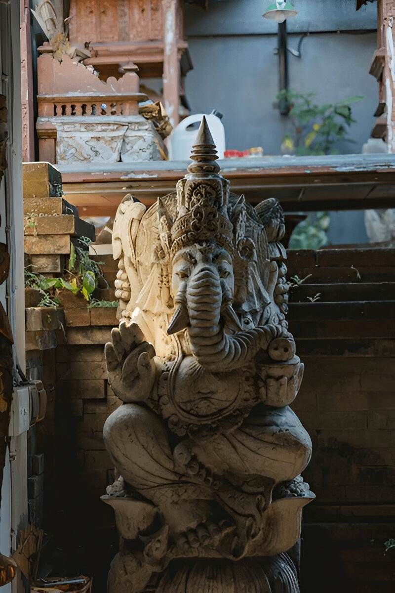 A Black Statue of an Elephant is Sitting on a Patio Next to a Pool — Sun City Pools In Hyde Park, QLD