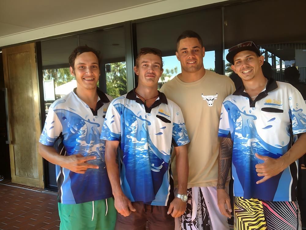 A Group of Young Men Are Posing for a Picture Together — Sun City Pools In Hyde Park, QLD