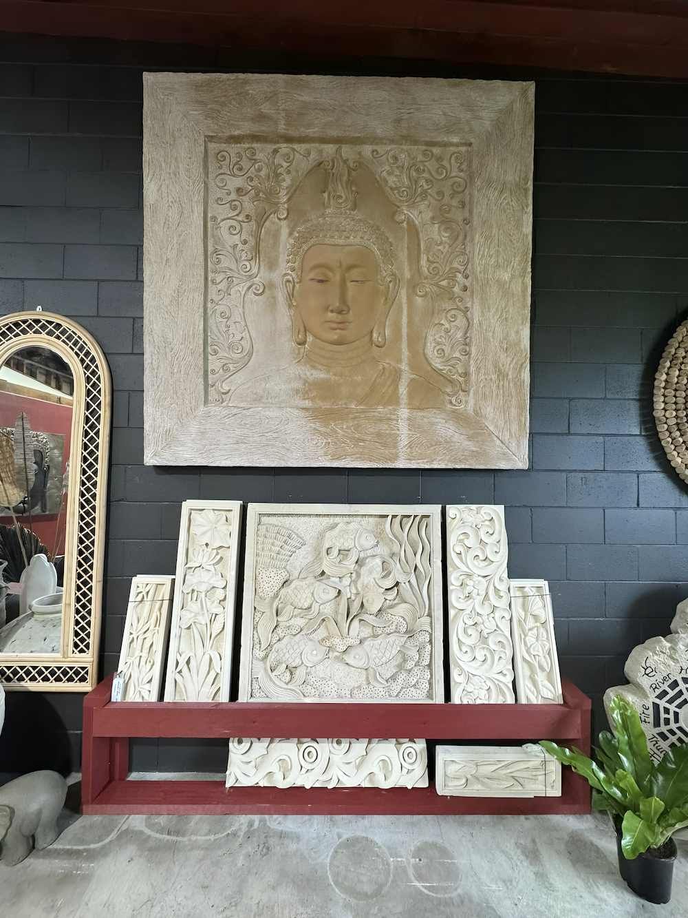 Decorative Wall that Features a Face and Petals of a Flower — Sun City Pools In Hyde Park, QLD