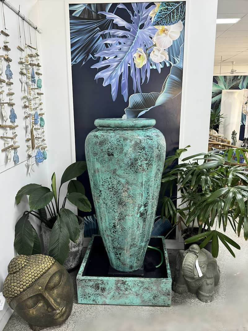 Large Green Vase with Green Plants Beside — Sun City Pools In Hyde Park, QLD