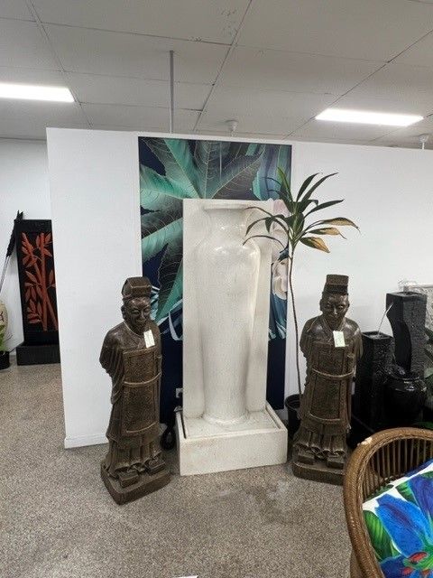 Two Statues Are Sitting Next to Each Other in a Room — Sun City Pools In Hyde Park, QLD