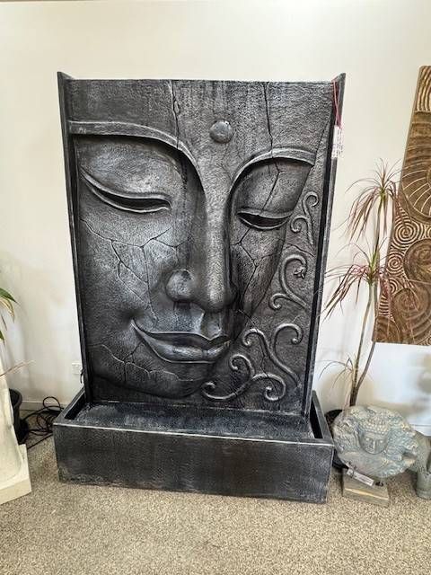A Buddha Face Fountain— Sun City Pools In Hyde Park, QLD