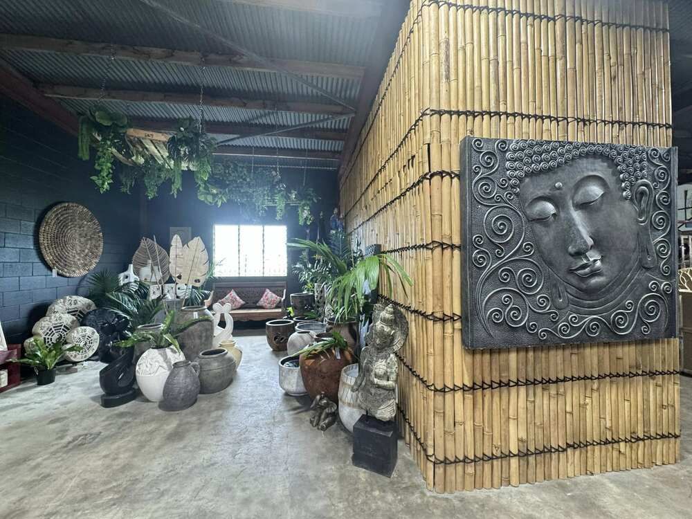 A Group of Statue and Vases Sitting on the Floor With White Sculpture — Sun City Pools In Hyde Park, QLD