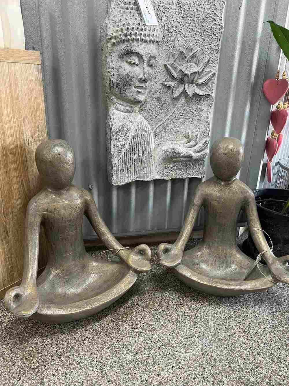 A Room Filled With Lots of Potted Plants and Statues — Sun City Pools In Hyde Park, QLD