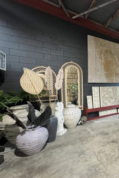 A Room Filled With Lots of Potted Plants and Vases — Sun City Pools In Hyde Park, QLD