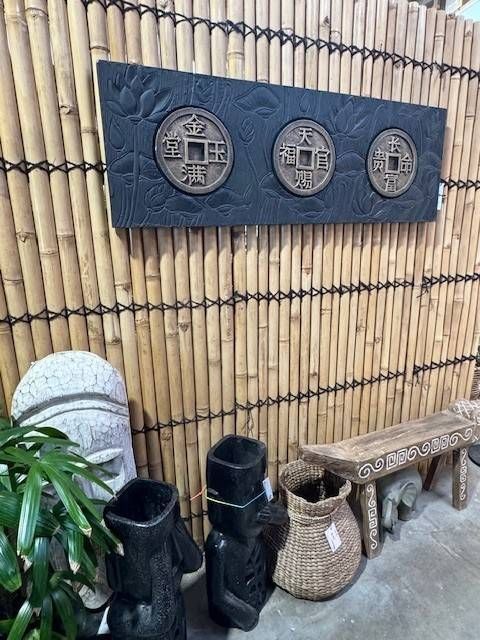 Balinese décor on a Bamboo Background — Sun City Pools In Hyde Park, QLD