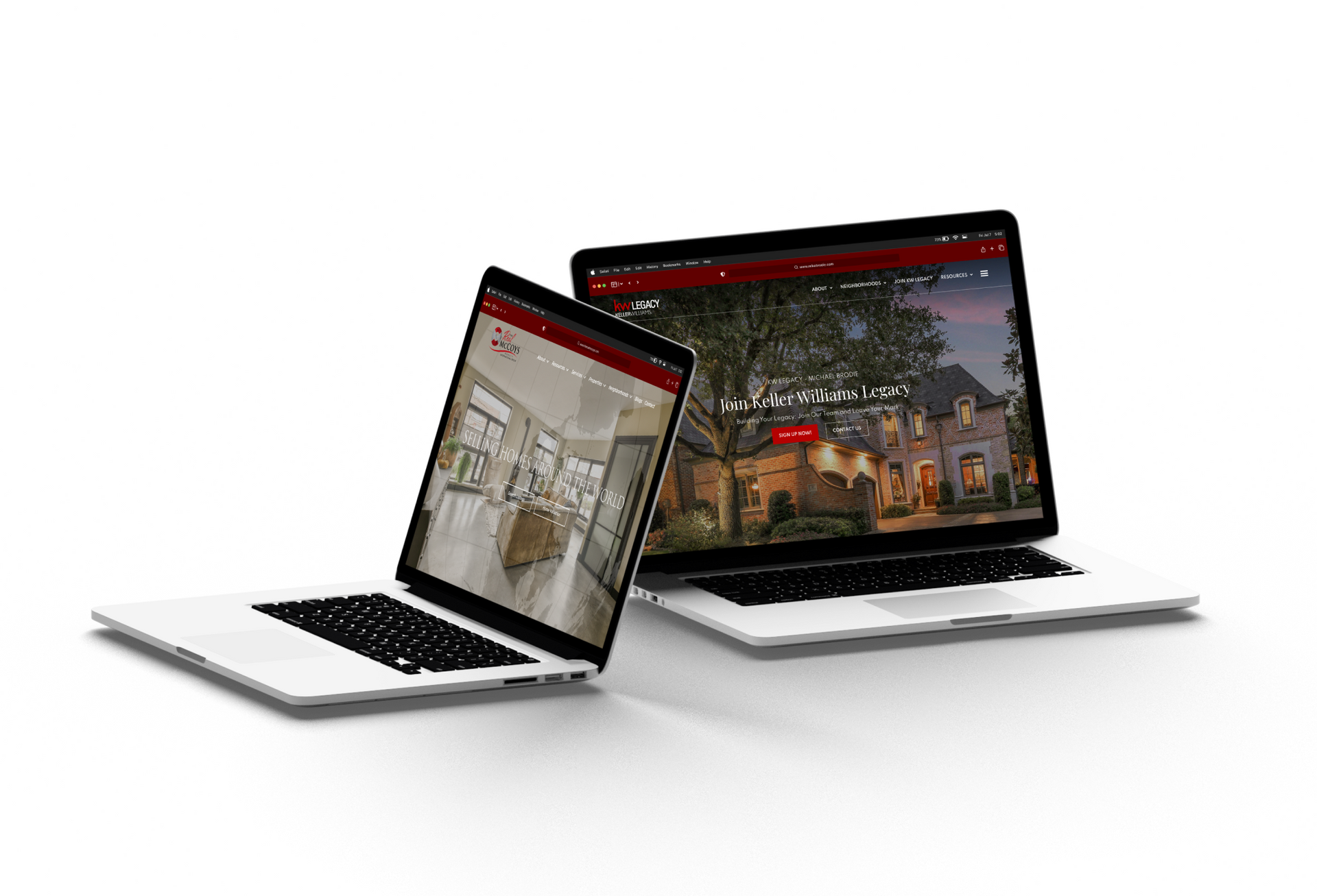 Two laptops are sitting next to each other on a white surface.