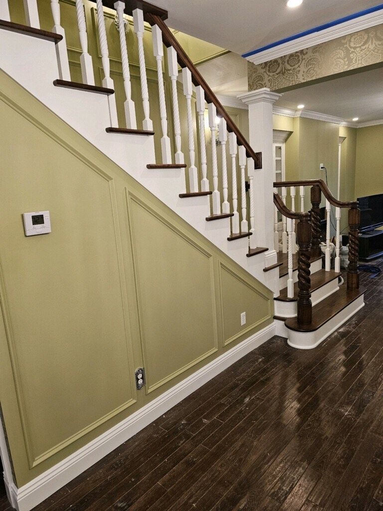 There is a staircase in the corner of the room.