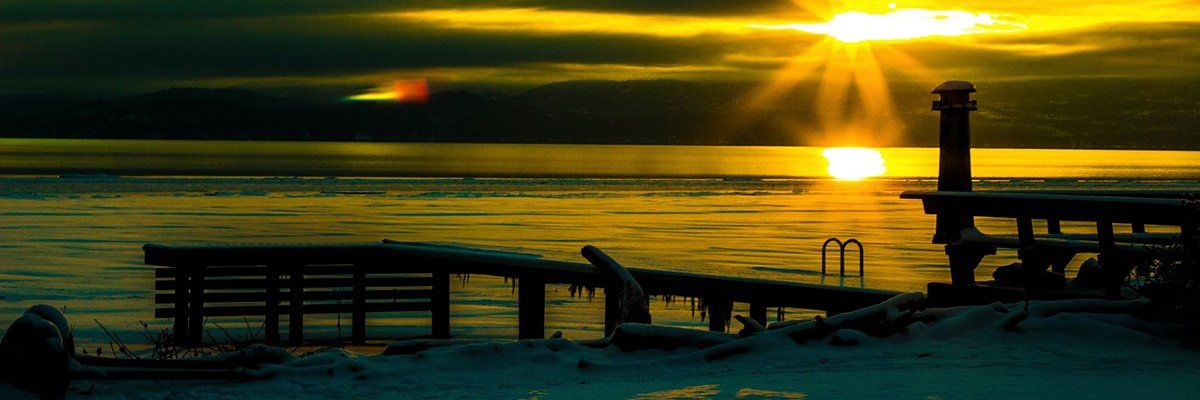 A frozen lake a sunset in Montana.