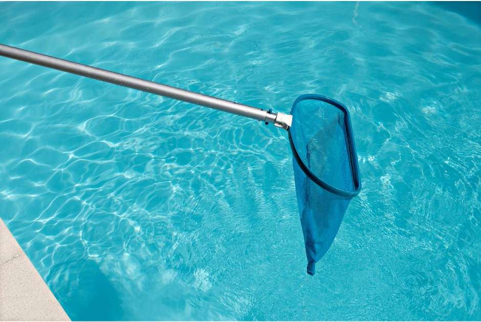 A picture of a pool cleaner hanging over a pool.