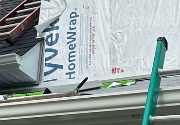Roof Inspection — Roofer Inspecting Roof in Syracuse, IN