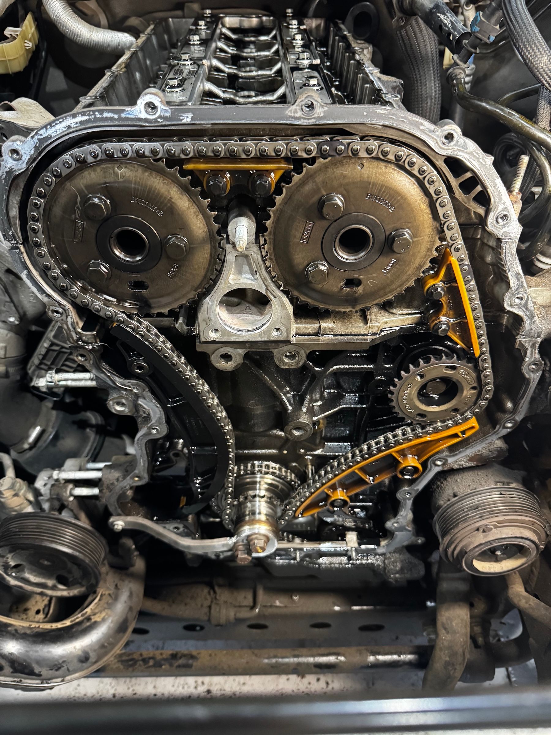 Diesel mechanic servicing a 4x4 ute engine in Welshpool workshop