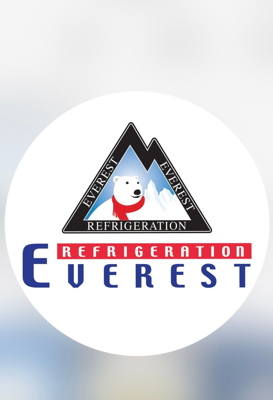 A logo for everest refrigeration with a polar bear on it