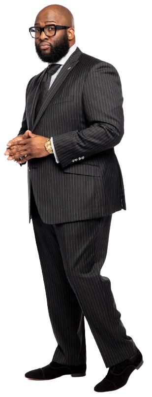 two men in suits are looking at a piece of paper