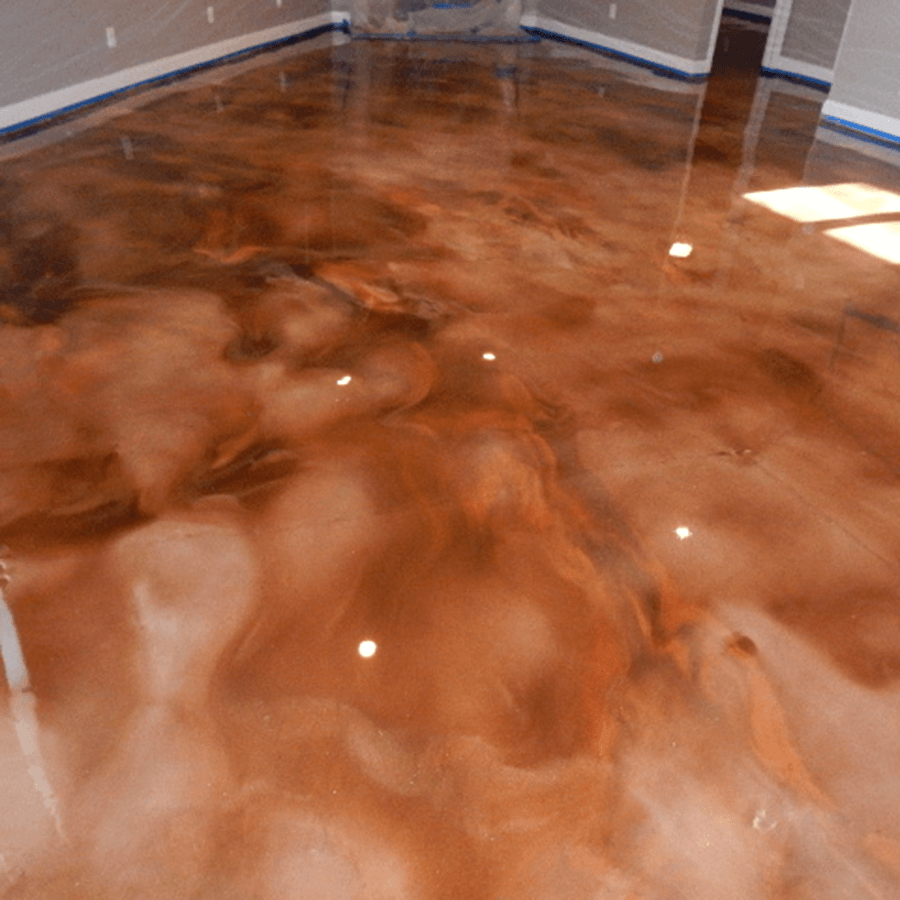 A living room with a brown metallic floor and a reflection of the floor in the wall.