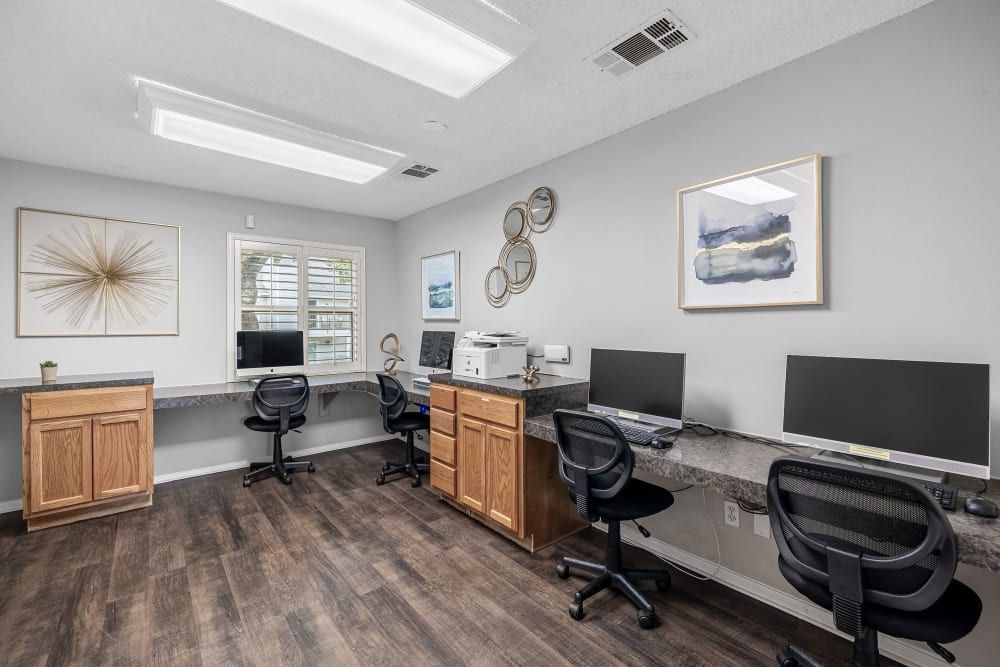 a room with a lot of computers and chairs in it at The Park at Flower Mound in Flower Mound, TX.