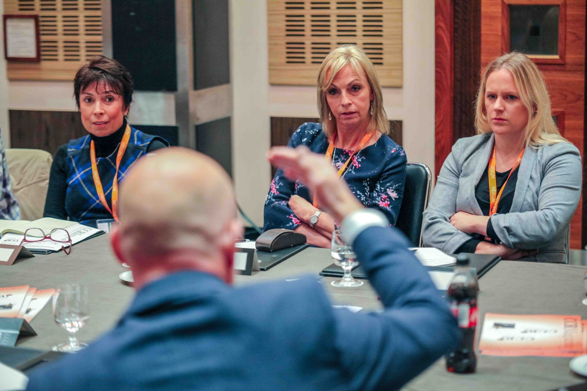 a round table discussion being photographed