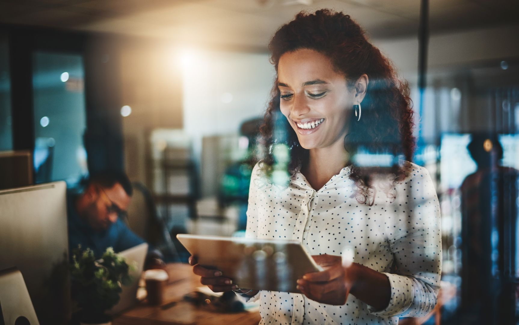 A bedroom with a bed and a chair in it