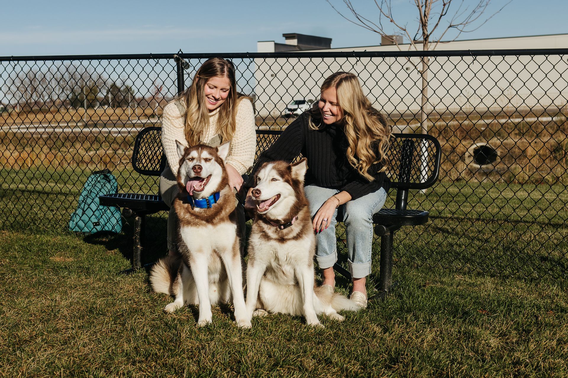 Two girls with two dogs