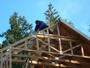 Man Working On The Roof