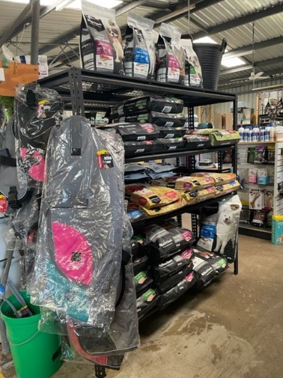 A Store Filled with Lots of Bags of Dog Food — Yeppoon Stockfeed & Rural Supplies in Yeppoon, QLD