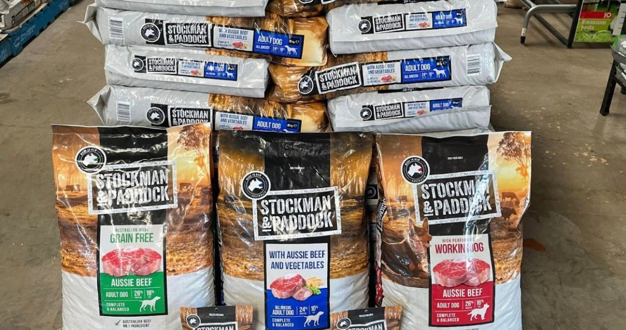 A Bunch of Bags of Dog Food Are Stacked on Top of Each Other in A Store — Yeppoon Stockfeed & Rural Supplies in Yeppoon, QLD