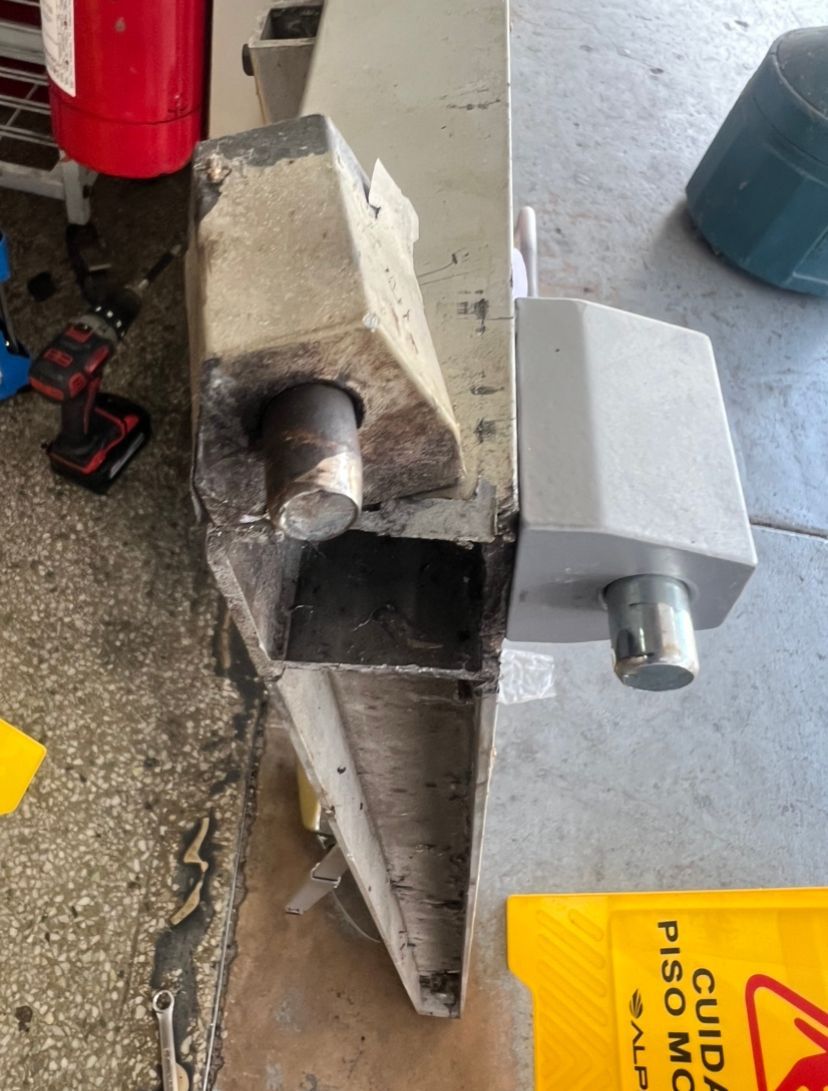 Piviot Hinges being replaced on a storefront door in Lakeland Florida