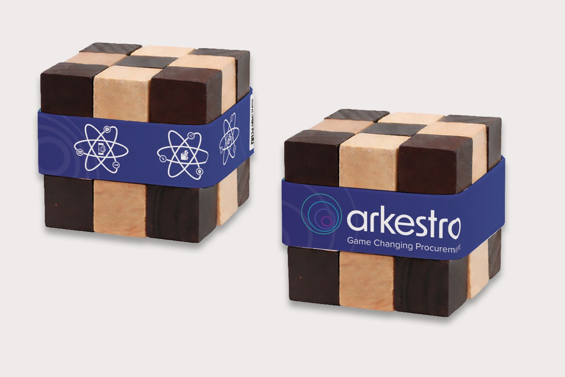 Two wooden checkerboard cubes with purple bands.