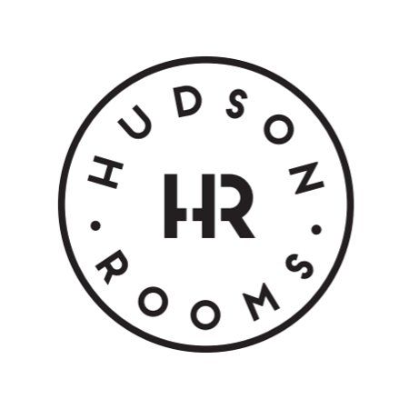 The hudson rooms logo is black and white and looks like a stamp.