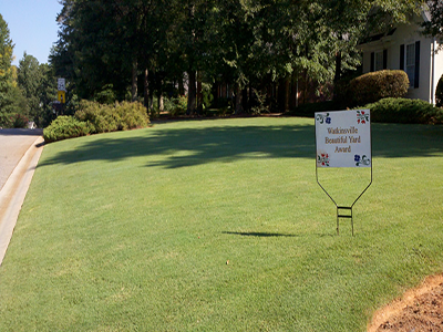 Lawn With Signage — Watkinsville, GA — Four Seasons Lawn Maintenance