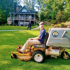 Man Riding Lawn Mower — Watkinsville, GA — Four Seasons Lawn Maintenance