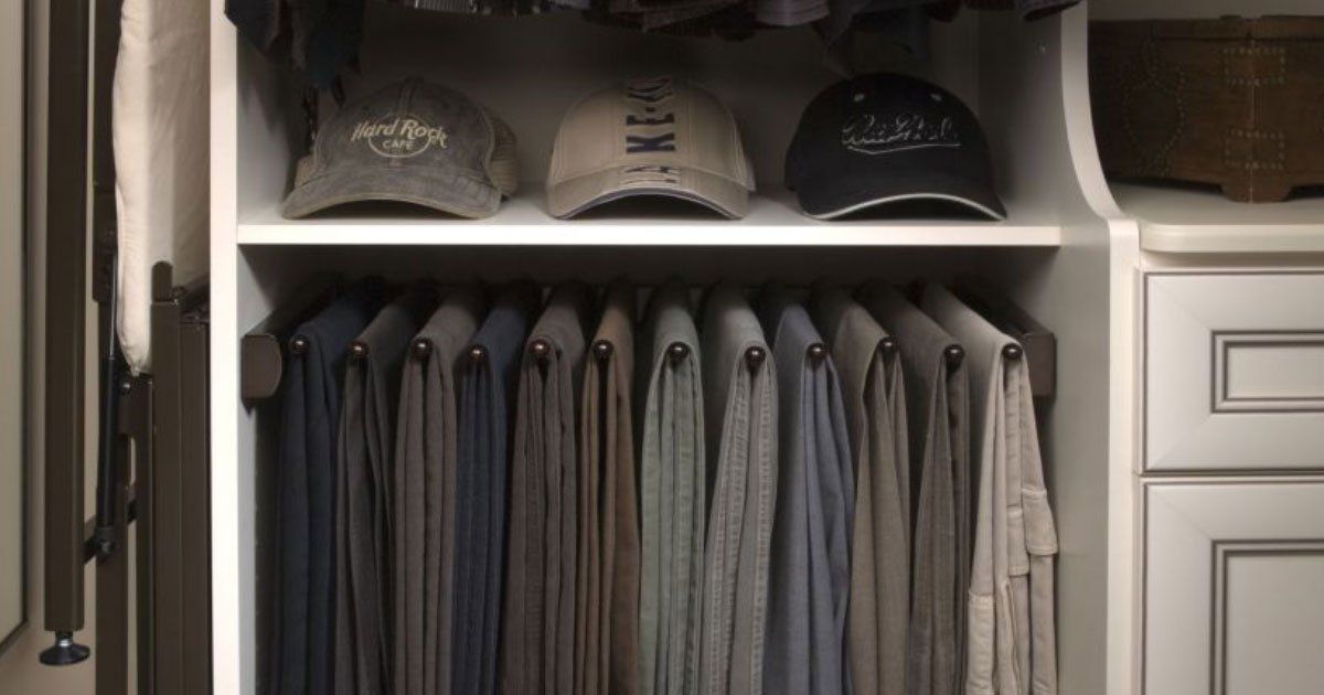 A closet filled with hats and pants.