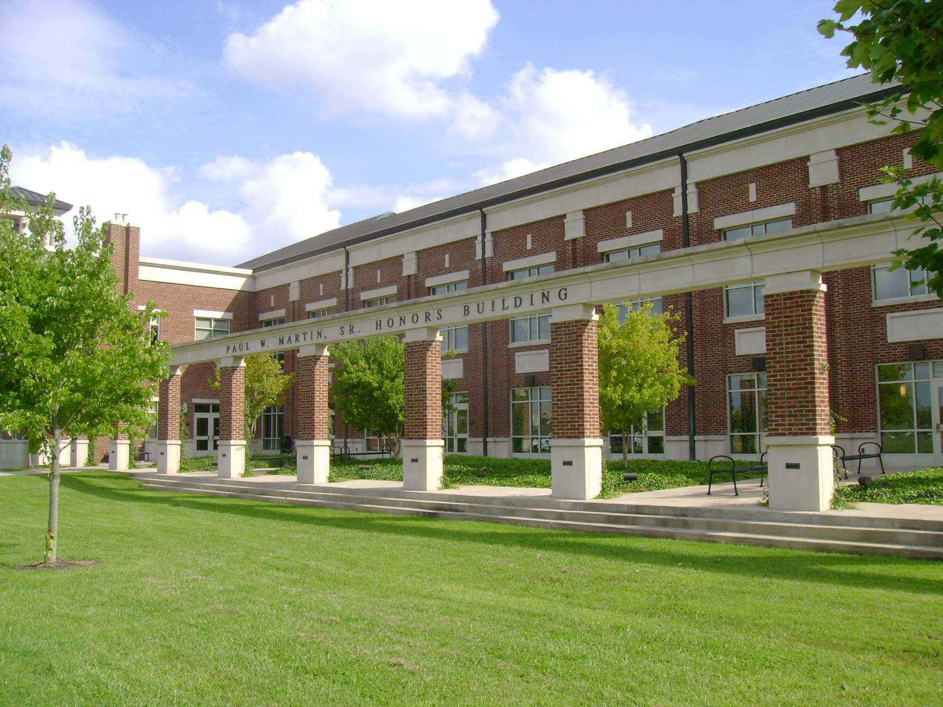 A large brick building with a sign that says ' the university of pennsylvania building '