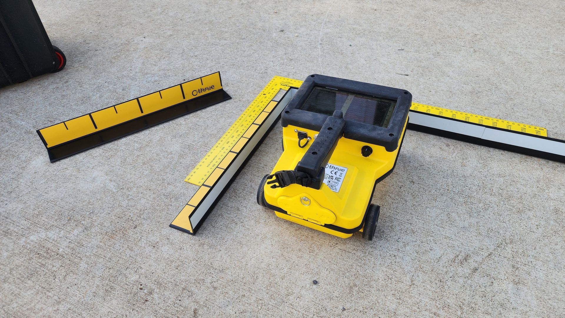 A Concrete Scanner With Tools and Rulers Next to It — Found It Down Under in Gympie, QLD