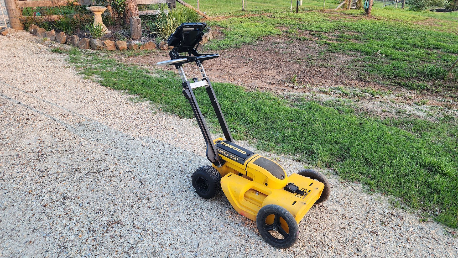 Yellow and Black Push-operated Lawn Mower on Gravel Path, Handle With Display — Found It Down Under in Maryborough, QLD