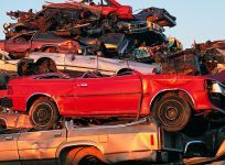 Old cars ready for scrap metal recycling in Queensland