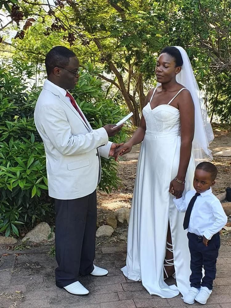 Couple Elopig Wearing White With Young Son — Lynda Ross Marriage Celebrant In Alice River, QLD