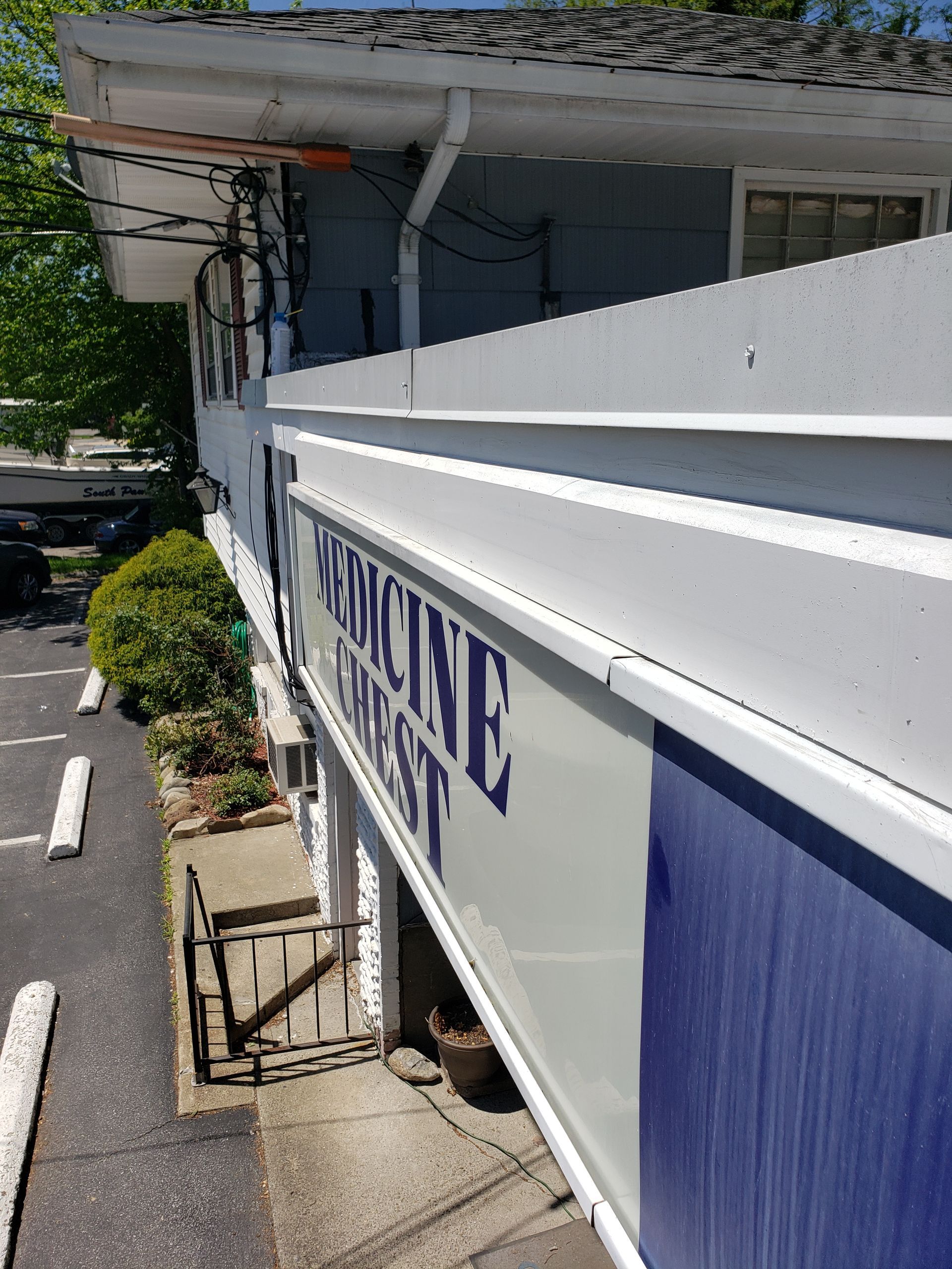 A building with a sign that says medicine on it