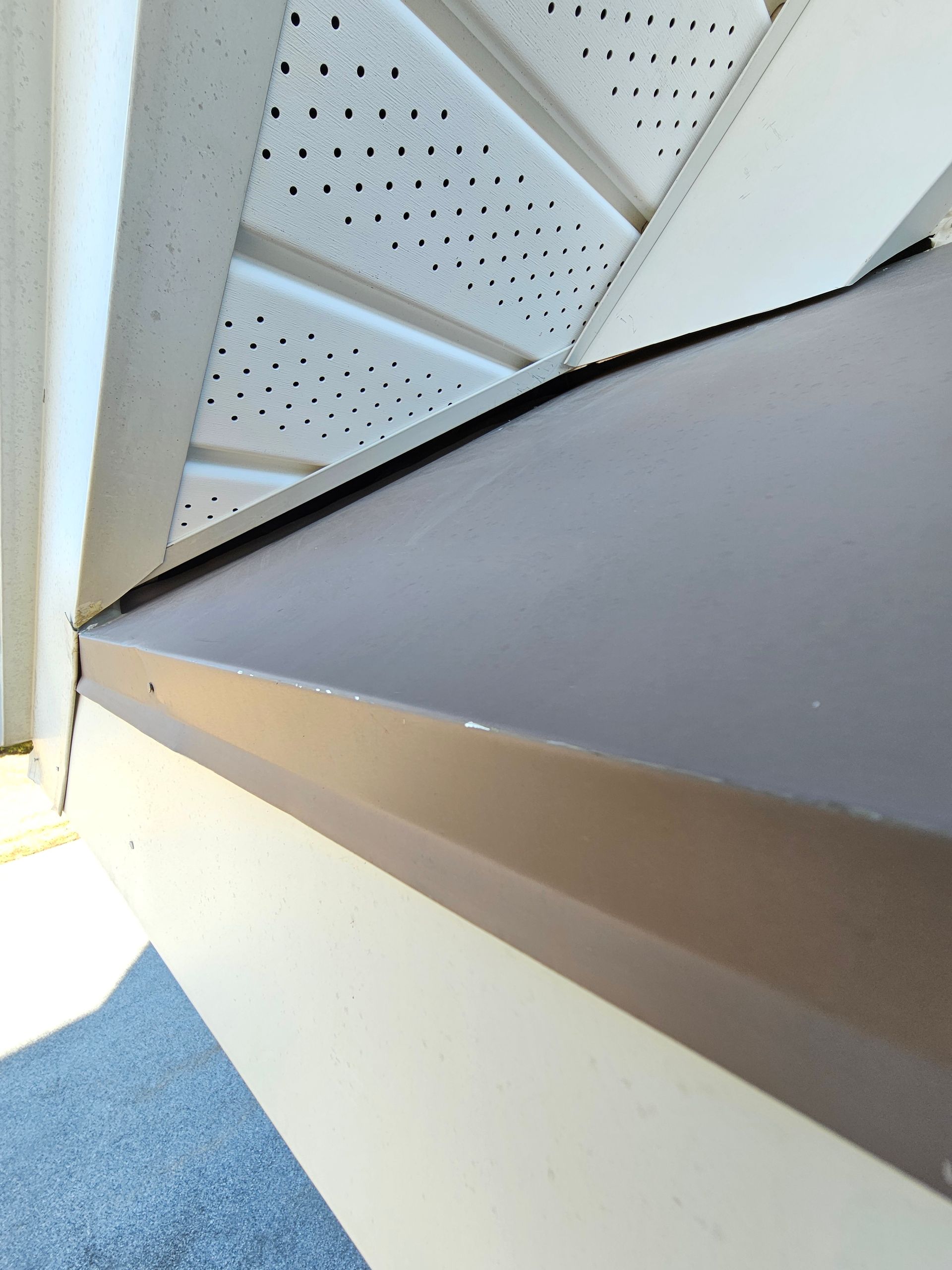 A close up of a window sill on a house