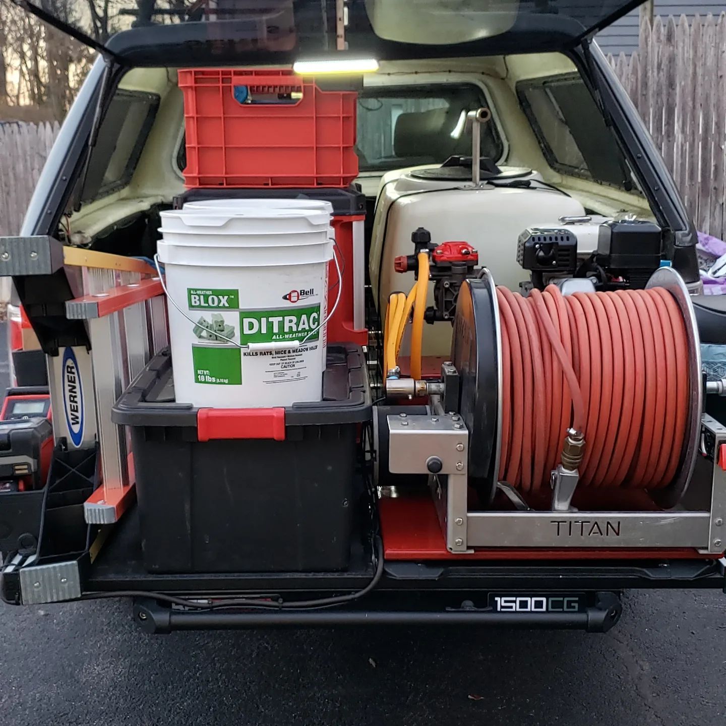 A ditras bucket sits in the back of a truck