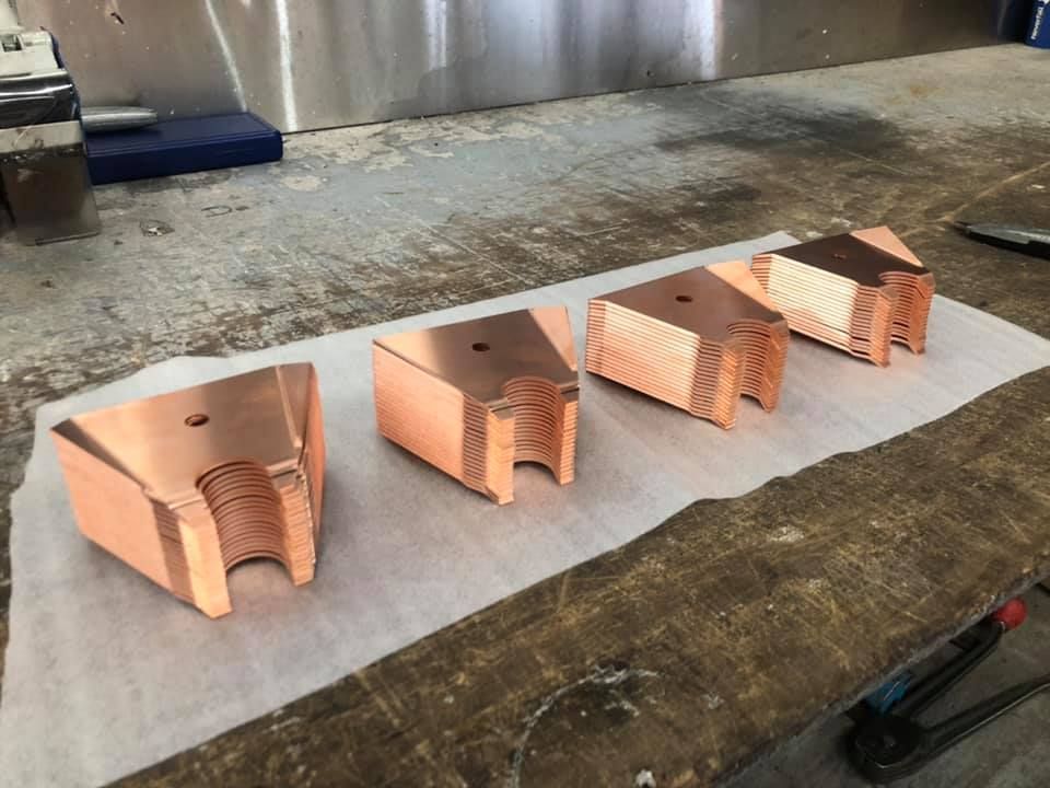 Copper pieces cut by Hygrade Laser.