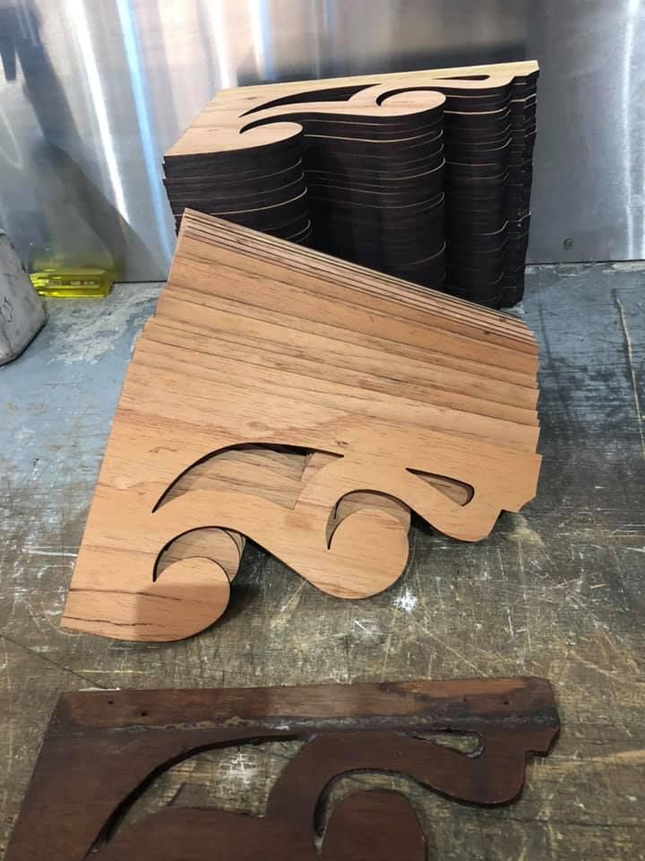 A pile of wooden pieces sitting on top of each other.