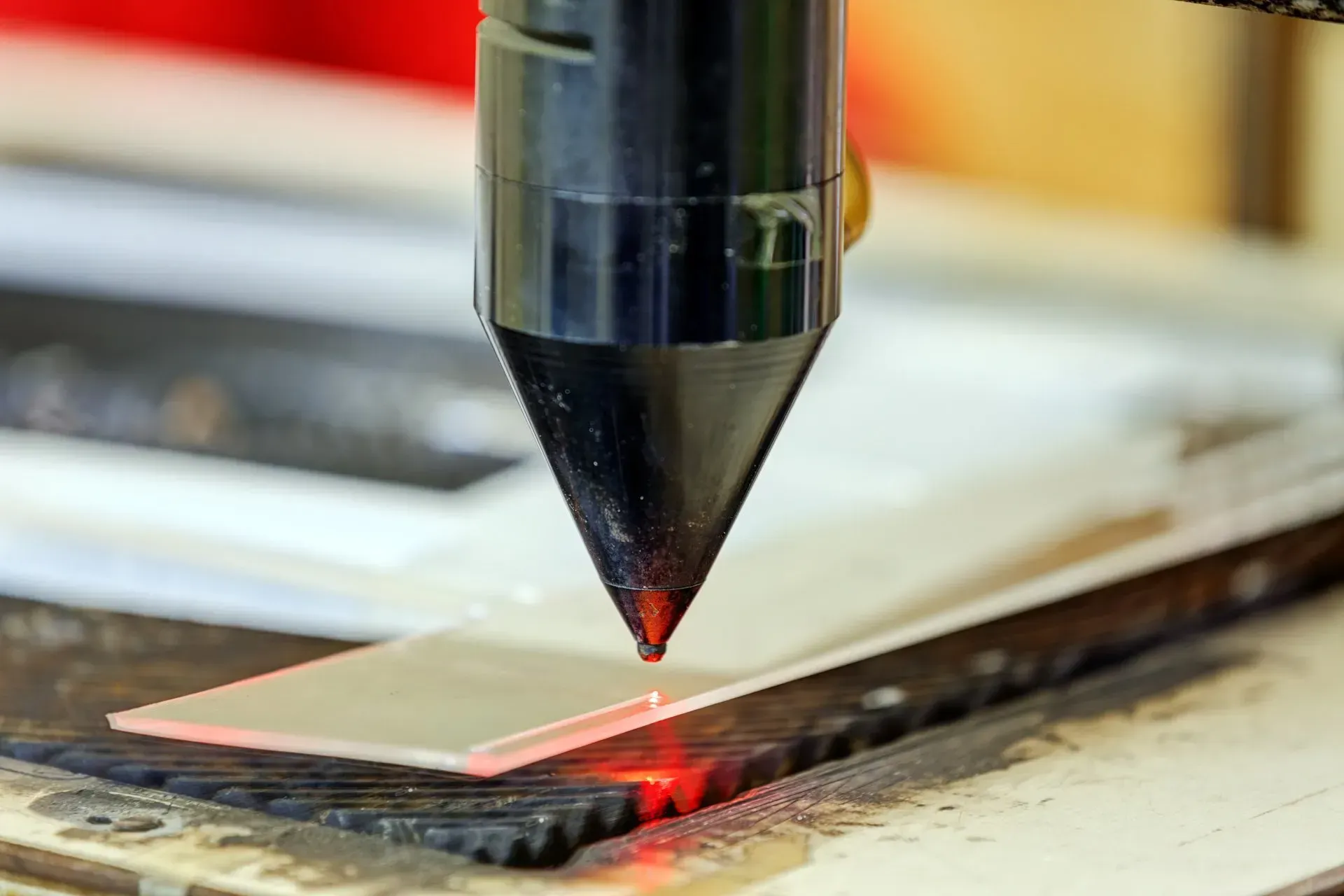 Red laser on cutting machine