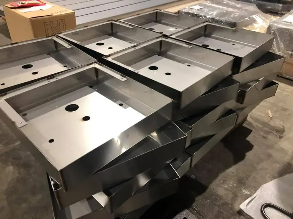 laser cut and CNC machined metal pieces