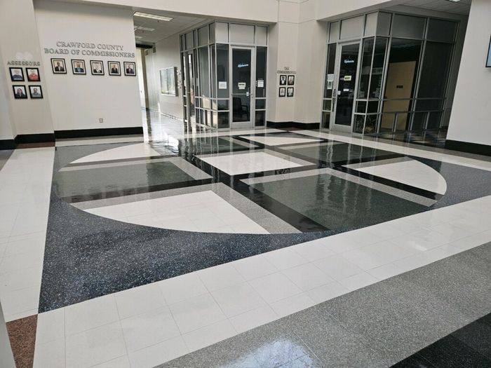 A hallway with a geometric pattern on the floor