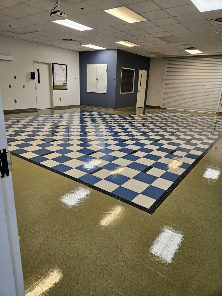 A large room with a blue and white checkered floor