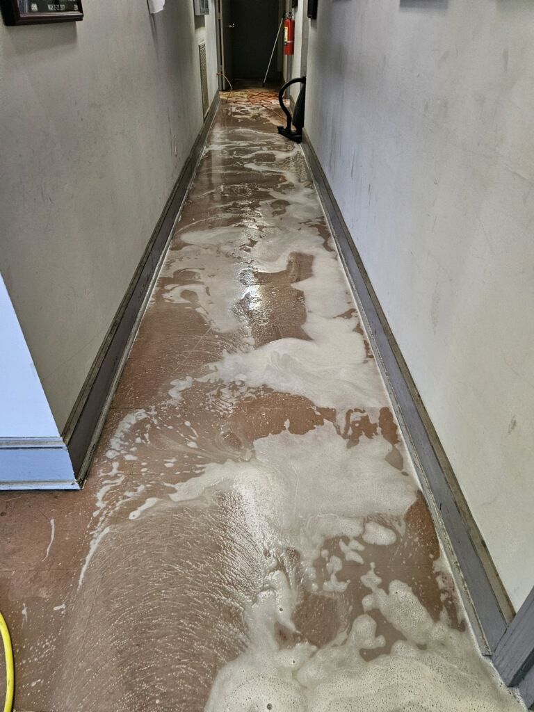 A long hallway with a lot of foam on the floor.